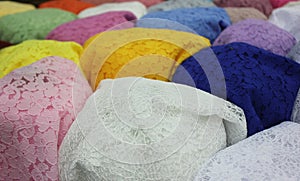 And the colorâ€‹fulâ€‹Â laceâ€‹ inâ€‹ Fabric shopâ€‹ atâ€‹ Wararos Market, Chiangmai.â€‹ Colorâ€‹fulâ€‹ laceâ€‹ background.